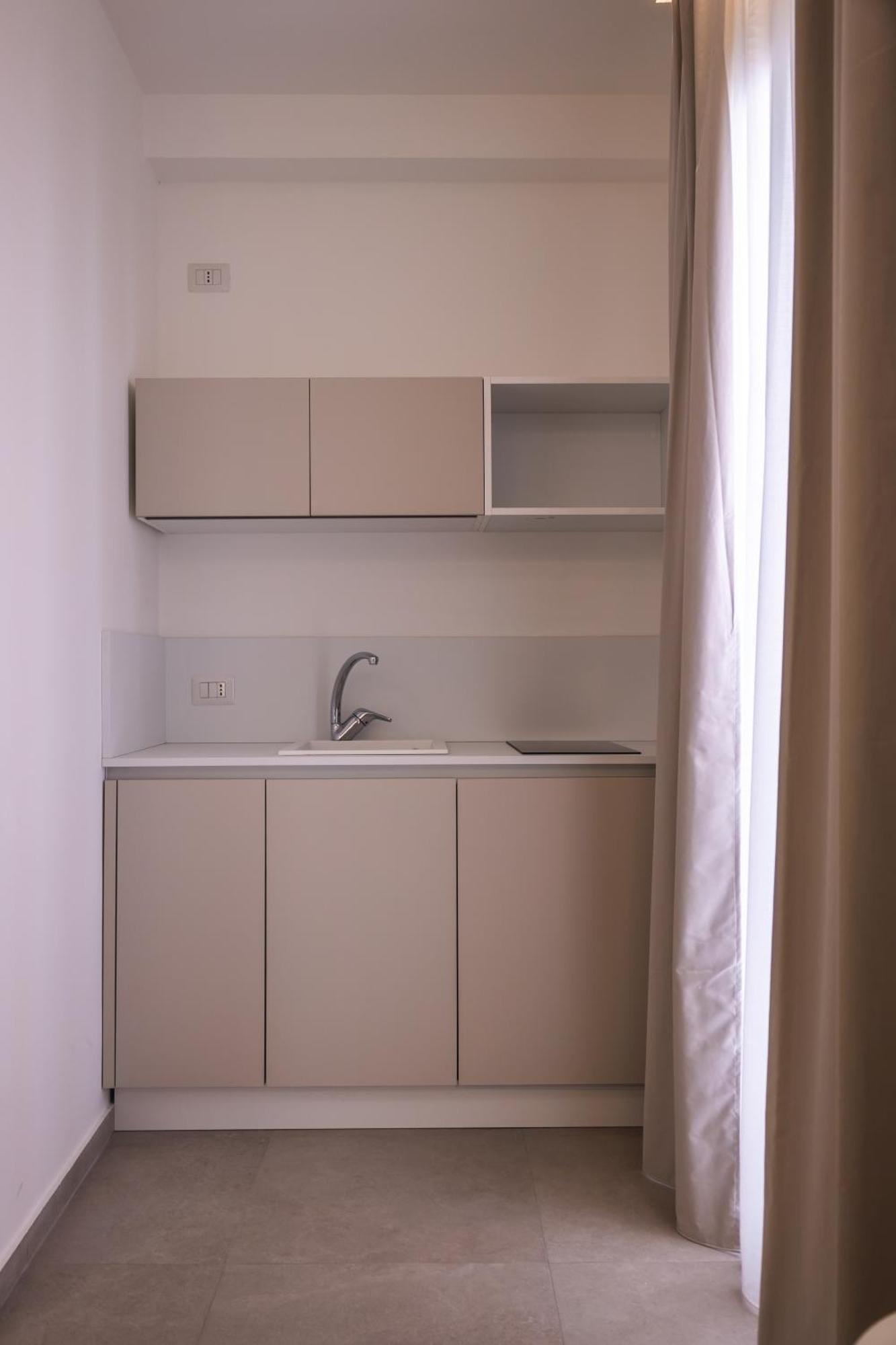 Atena Room يتوجاني المظهر الخارجي الصورة